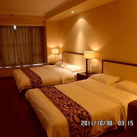 Guangzhou Meiyijia Hotel Apartment Oda fotoğraf