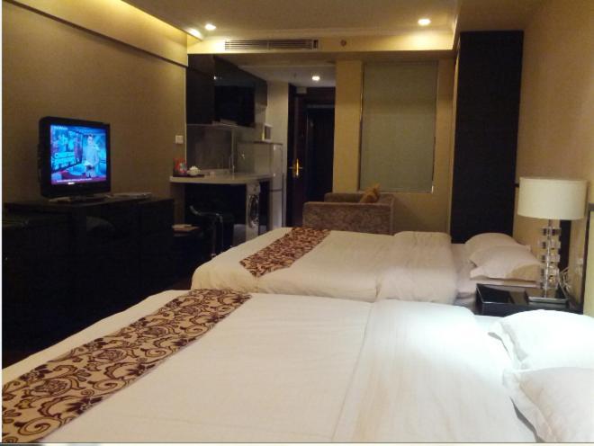 Guangzhou Meiyijia Hotel Apartment Oda fotoğraf