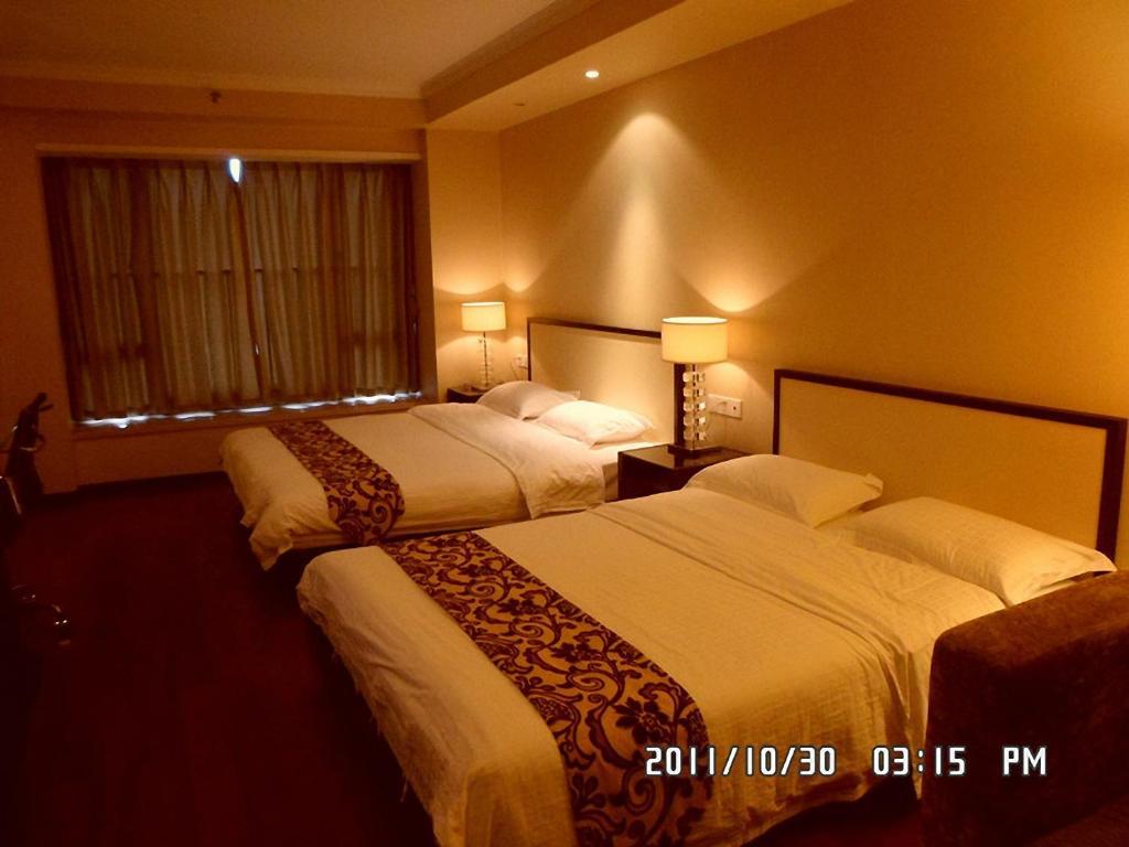 Guangzhou Meiyijia Hotel Apartment Oda fotoğraf