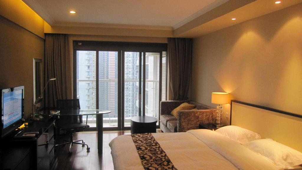 Guangzhou Meiyijia Hotel Apartment Oda fotoğraf