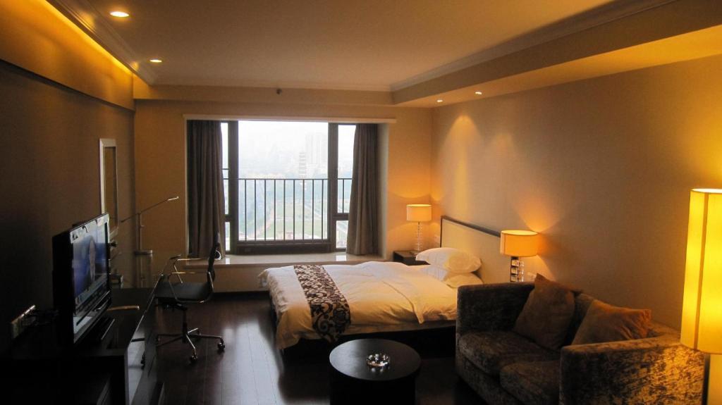 Guangzhou Meiyijia Hotel Apartment Oda fotoğraf