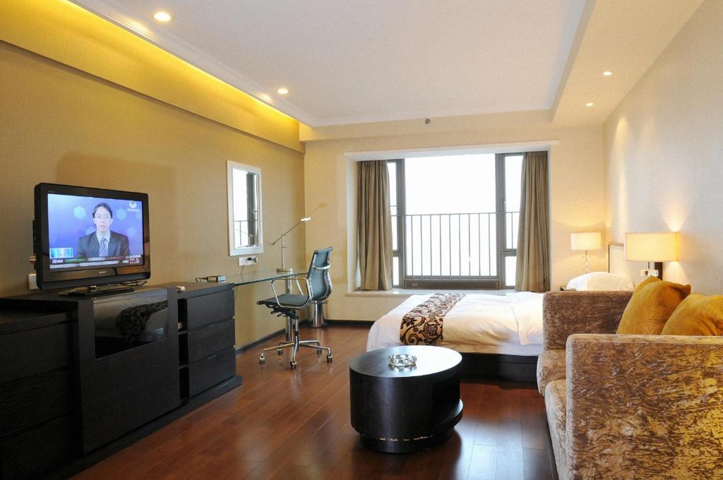 Guangzhou Meiyijia Hotel Apartment Oda fotoğraf