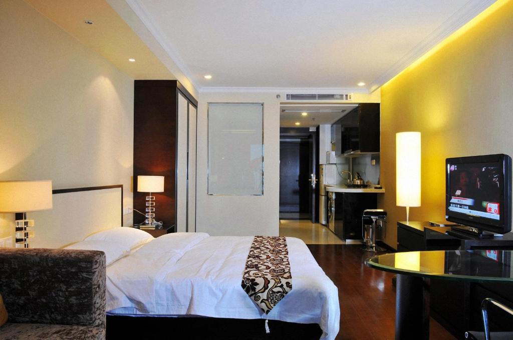 Guangzhou Meiyijia Hotel Apartment Oda fotoğraf
