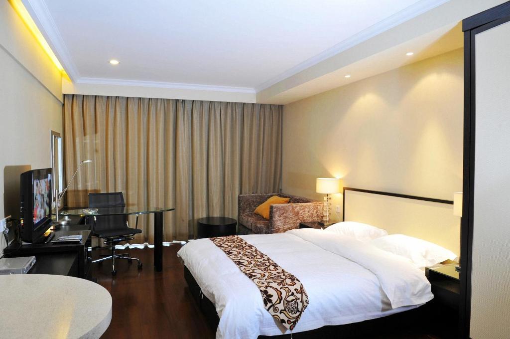 Guangzhou Meiyijia Hotel Apartment Oda fotoğraf
